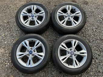 Alu orig zimní sada Ford Focus 5x112 7J ET50 215/55 R16 - 2