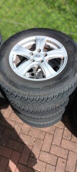 KIA Sportage - sada zimních kol s Alu.disky 6,5x16 ET 31,5 - 2