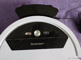 Robotický vysavač. - 2