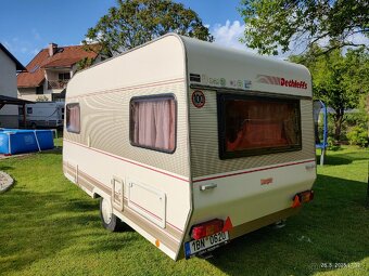 Karavan Dethleffs camper se stanem a zimní plachtou - 2