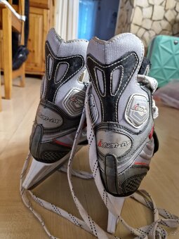 Rostoucí dětské brusle Action - Evo - 2