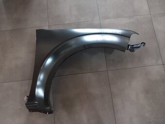 Nový orig. pravý blatník Nissan NAVARA 2005-2015 - 2