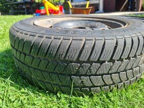 Rafky z Forda 4x 107mm, a 3x zimaky 185/60R14 - 2