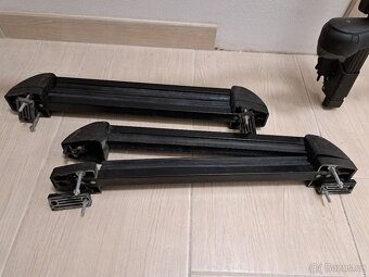 Dva střešní nosiče Thule ProRide 591 pro kola + nosiče lyží - 2