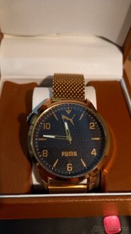 Hodinky Rolex.  Breitling  za 2000.kc - 2