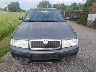 ŠKODA OCTAVIA  1. = 1,6i BENZIN 75 KW  TOUR - 2