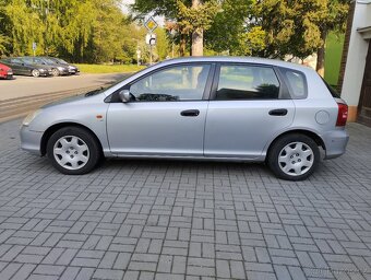 Honda Civic 7G 1.6i - 2