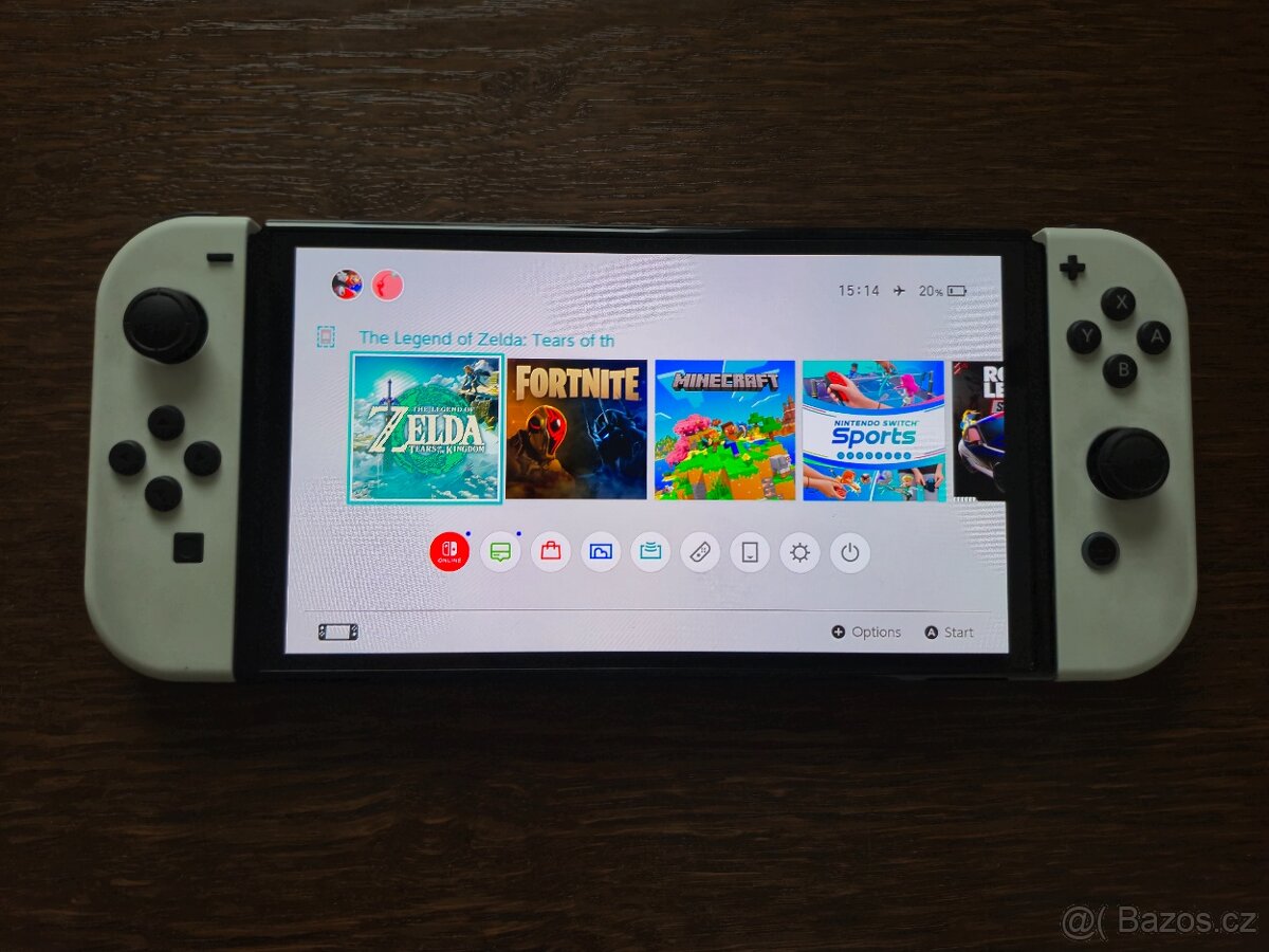 NINTENDO SWITCH OLED (bílá verze) + 4 HRY A CESTOVNÍ OBAL - 3