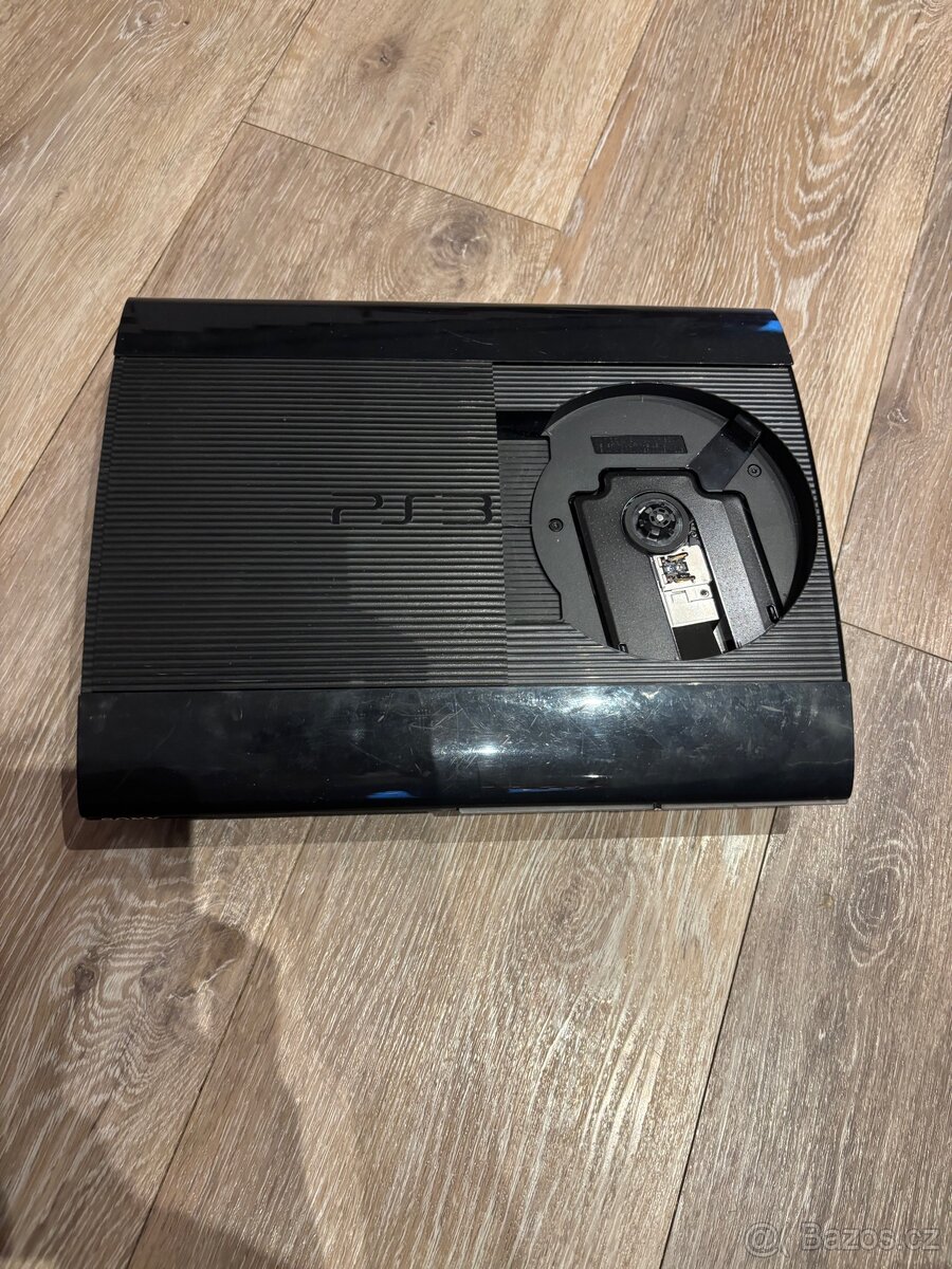 PLAYSTATION 3 – Konzole + 2 ovladače + volant + 5 her - 3