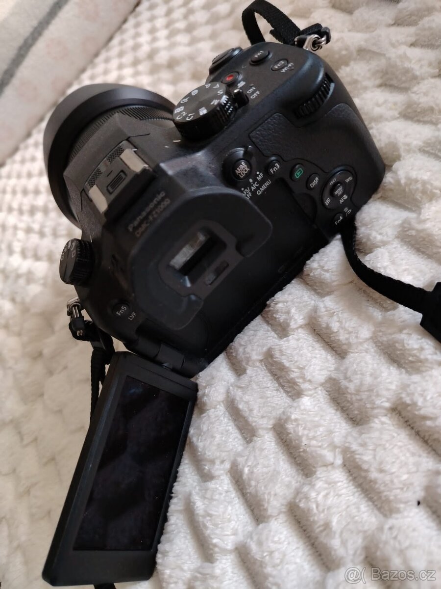 canon s objektivy a taškobatůžkem - 3