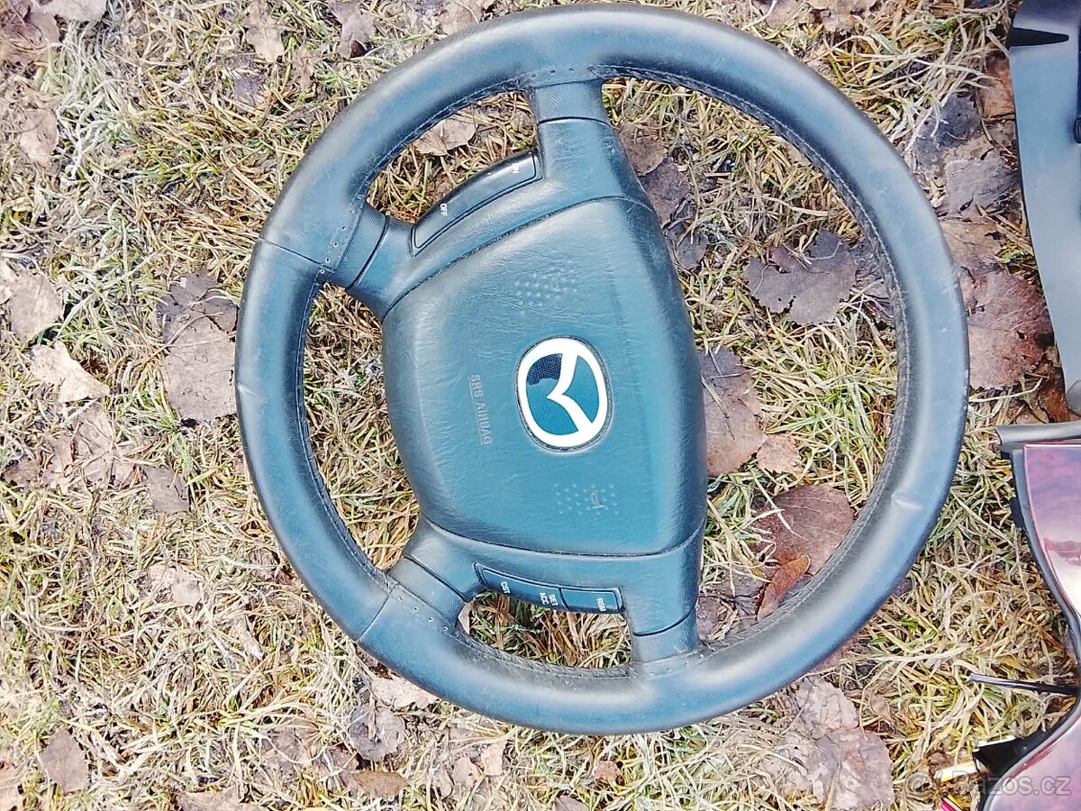 Mazda tribute - 3
