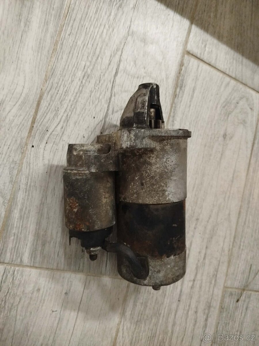 Startér Mazda 626 1.8 - 3