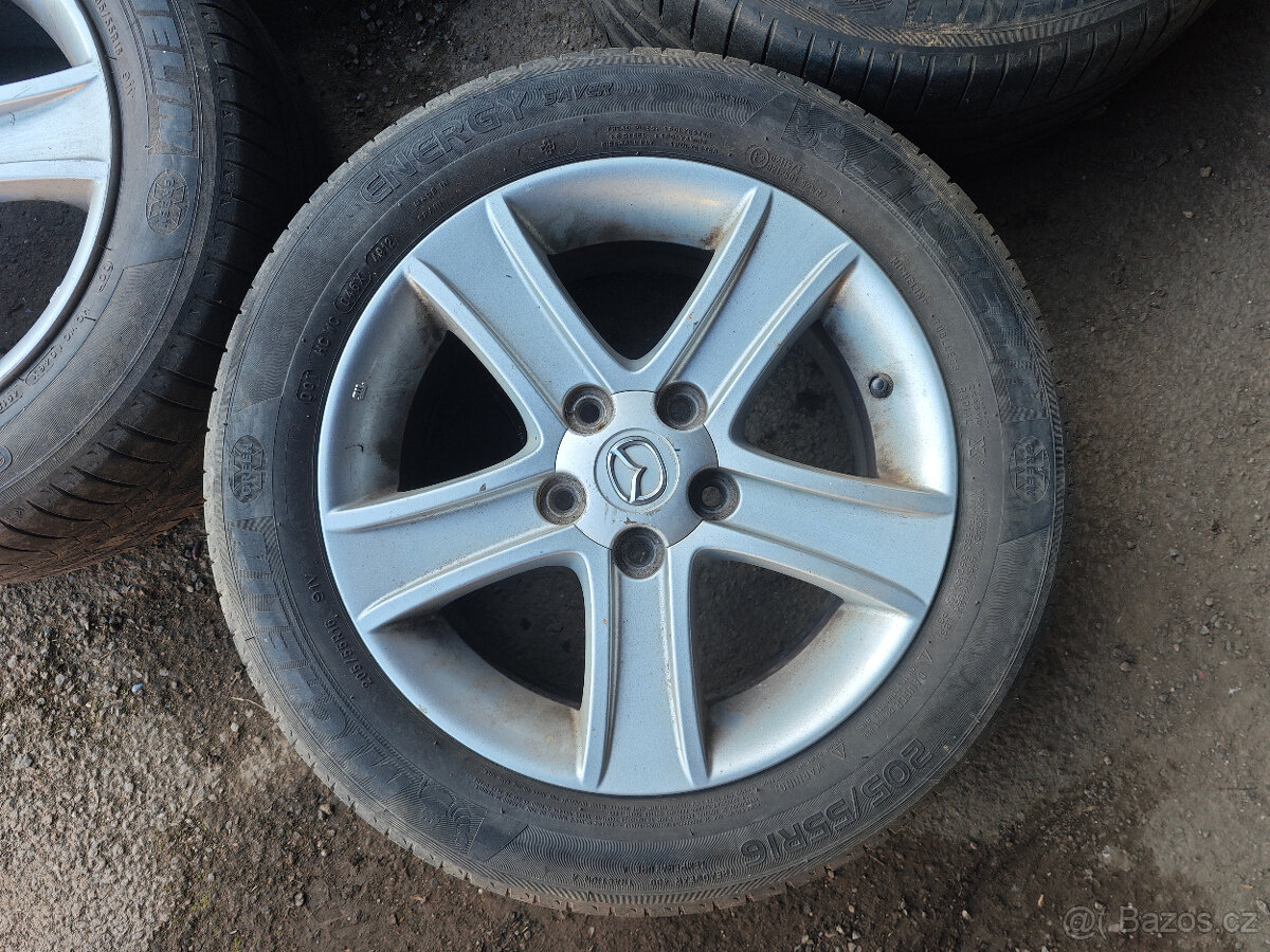 Prodám sadu Alu disků Mazda 7Jx16H2 ET55 + le pneu 205/55/16 - 3