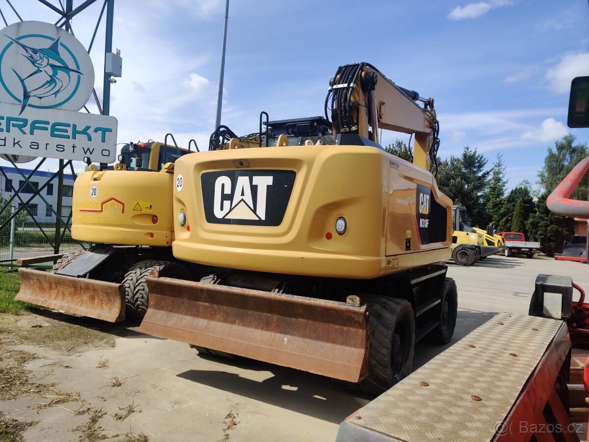 Kolový bagr CAT 318 F - 3