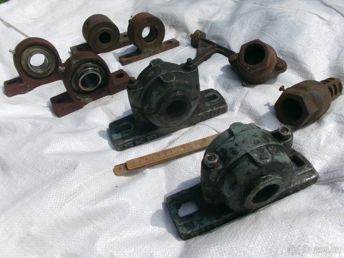 prodám různé hřídele, železné a dřevěné kolečka..... Železné - 3