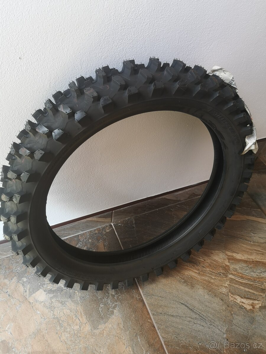 Bridgestone 100/90 R19, nepoužitý zadní drapák.
