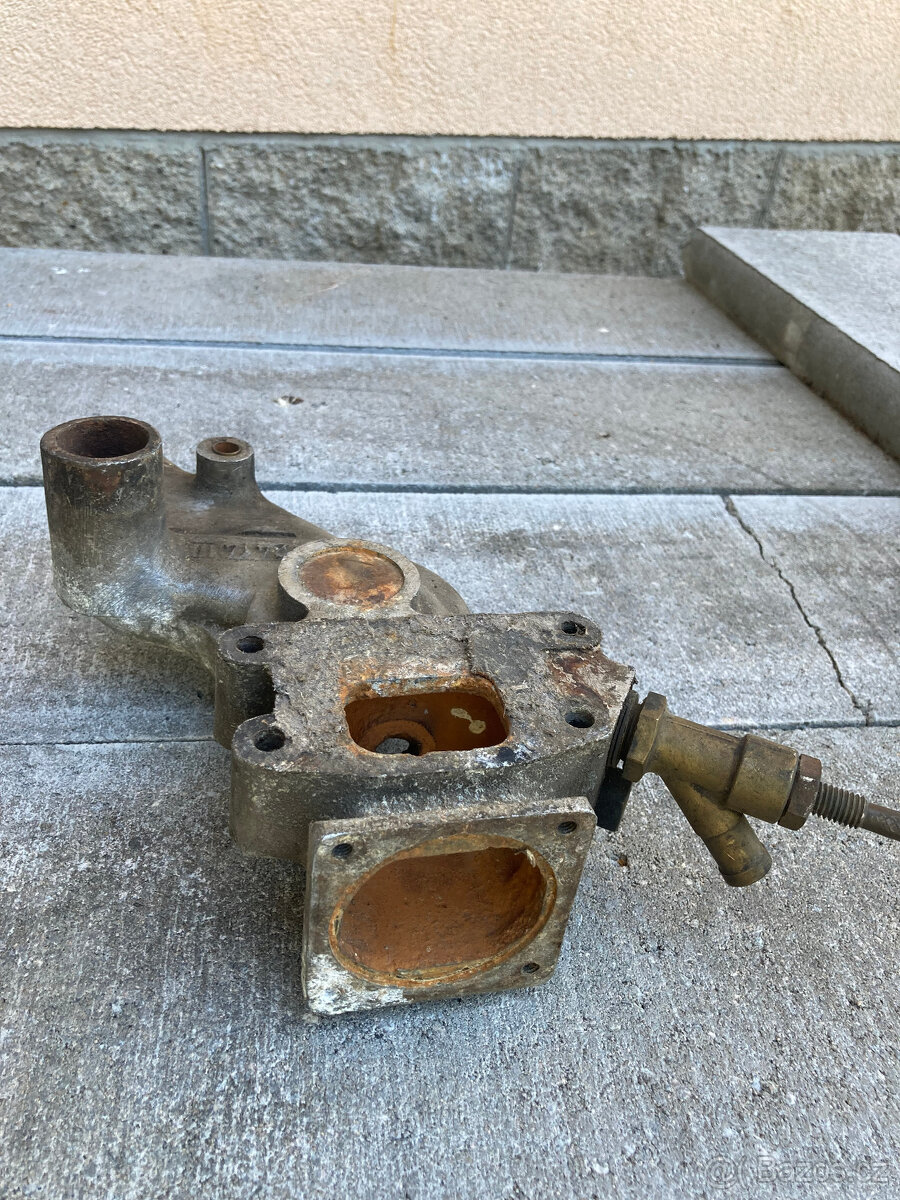 Těleso vodní pumpy OCTAVIA, FELICIA s ventilem topení - 3