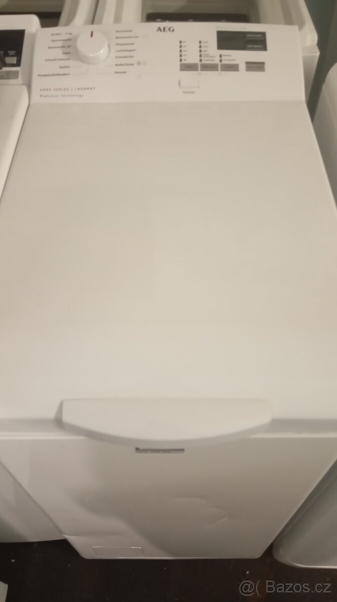 Vrchem plněná pračka AEG - 3