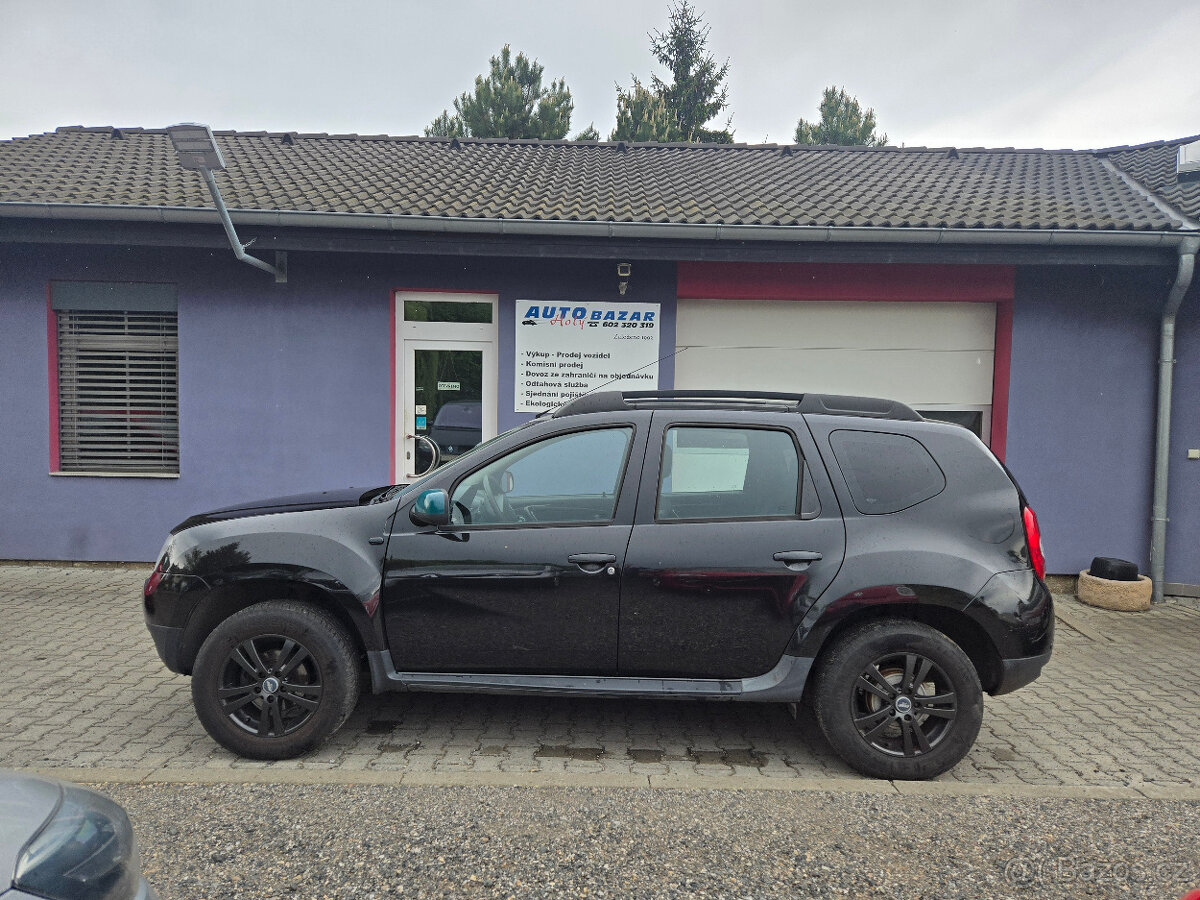 Duster 1,6 16V-77kW LAUREATE+sada zimních kol - 3
