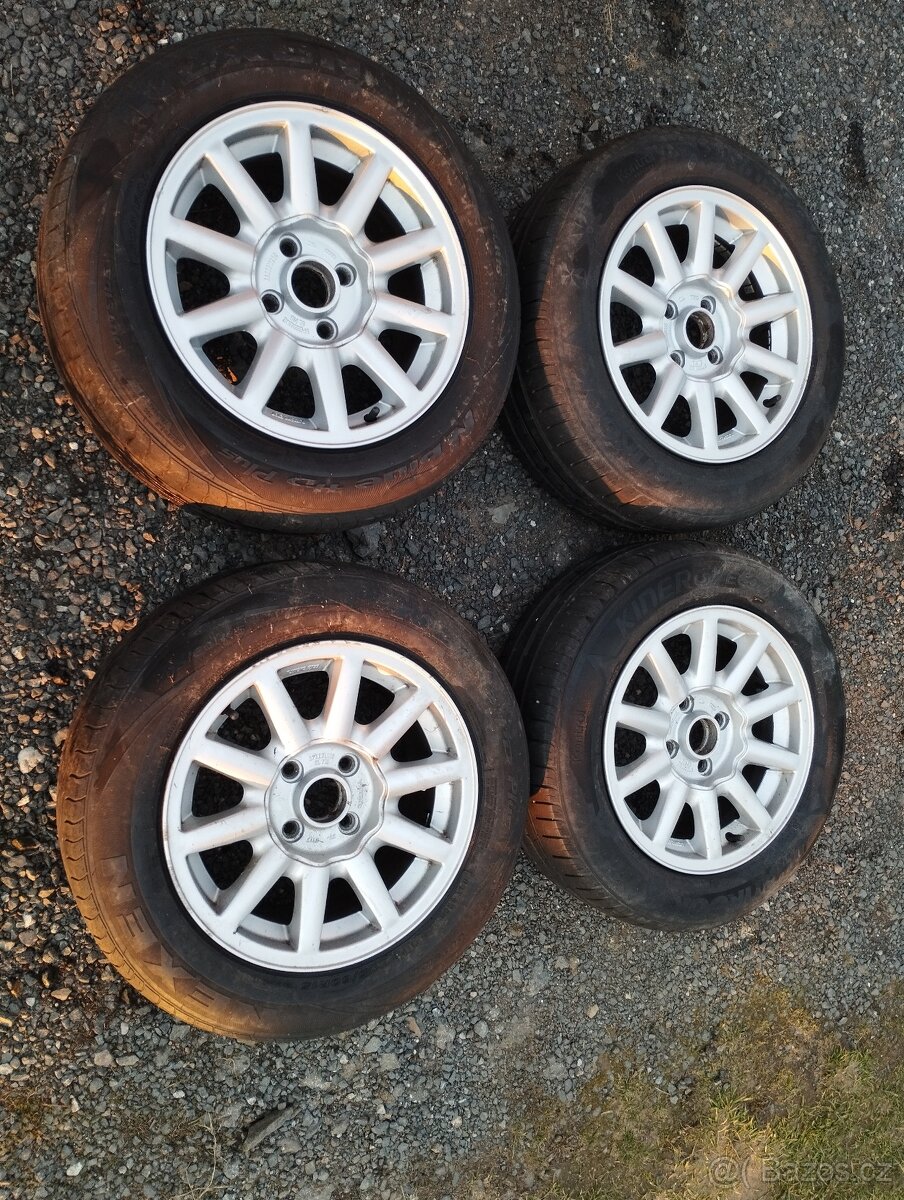 Prodám alu disky Audi 80 s roztečí 4x108. - 3