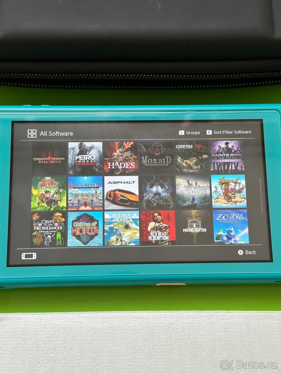 Nintendo Switch Lite 128GB + Spousta her + bonusy Aukce - 3