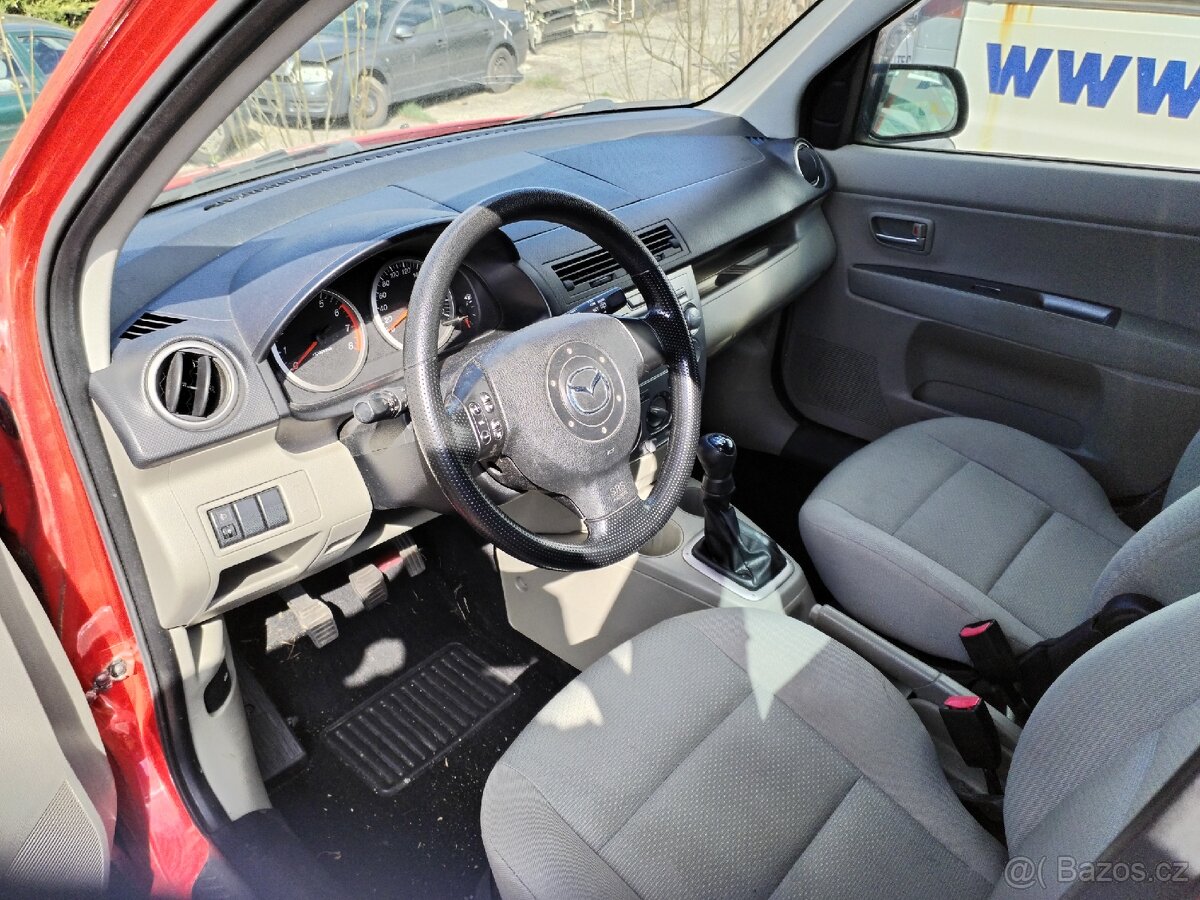 Prodám jen díly Mazda 1.3 55kw - 3