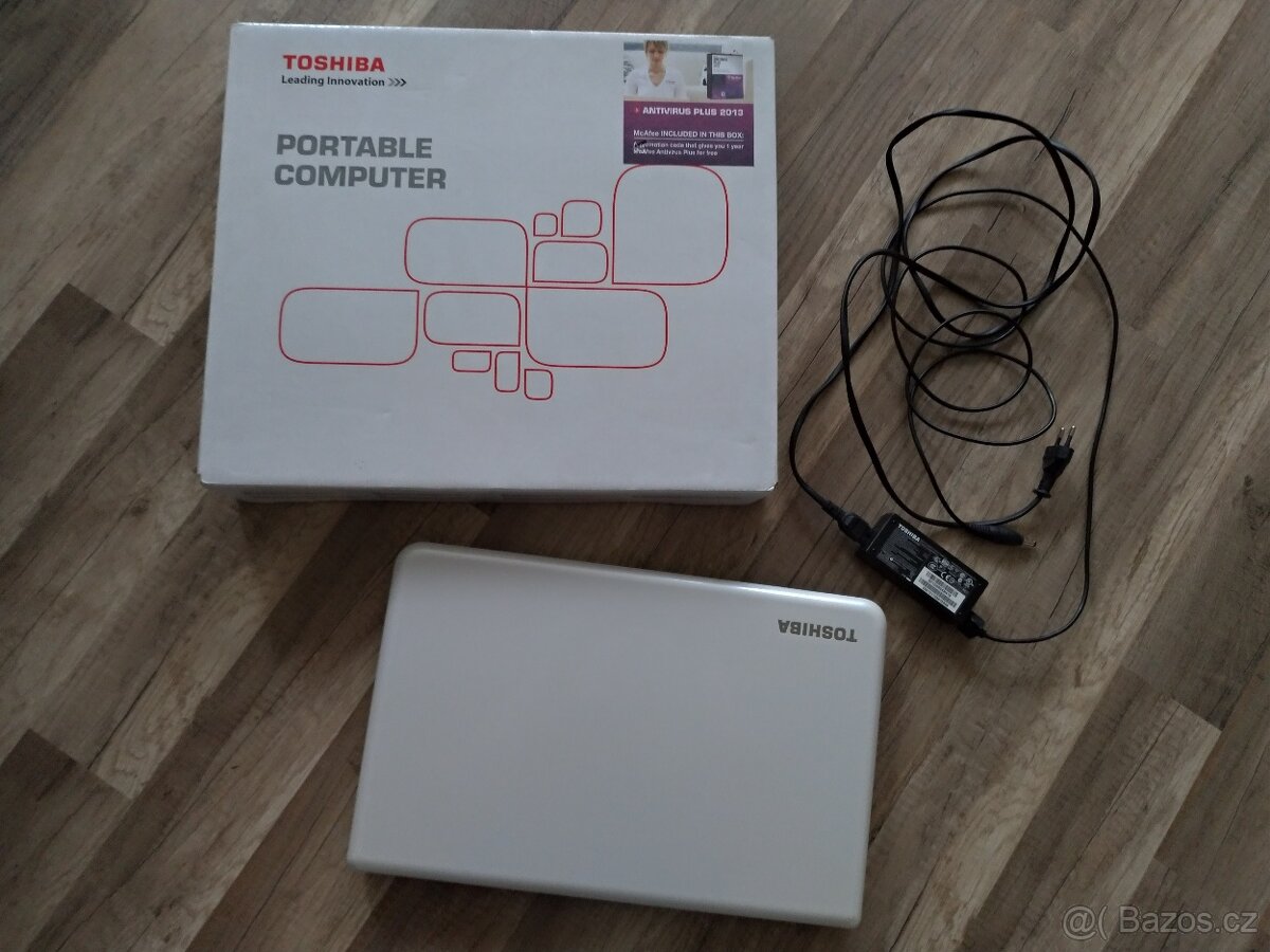Bílý notebook Toshiba s Win - 3