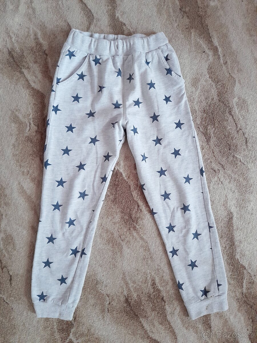 12x tepláky vel. 128-134/140. - 3