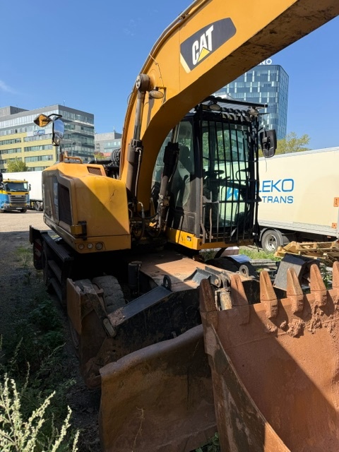 Caterpillar kolový bagr MH 3022 - 3