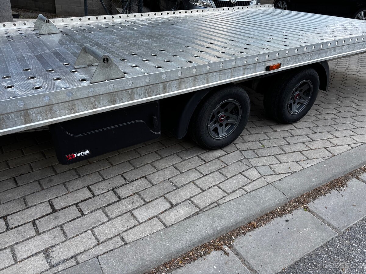 Gromex L4.6m 2700kg alu kola top stav
