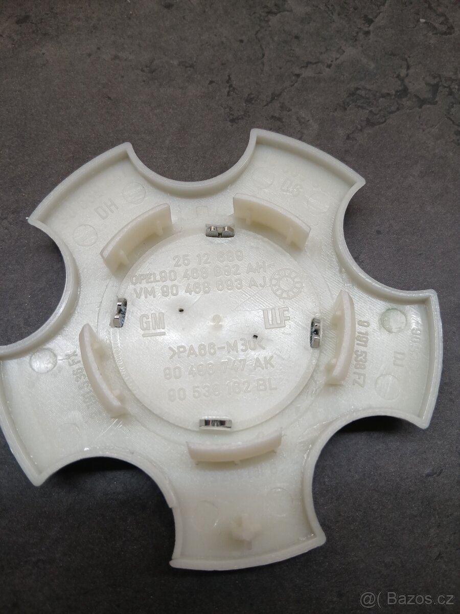 Poklice. Středová krytka kola 90468692, Opel - 3