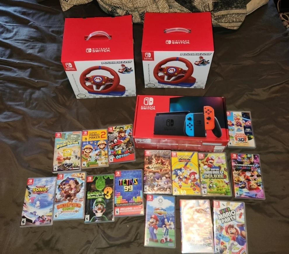 Prodám Nintendo Switch + 2xvolant a 15 her - 3