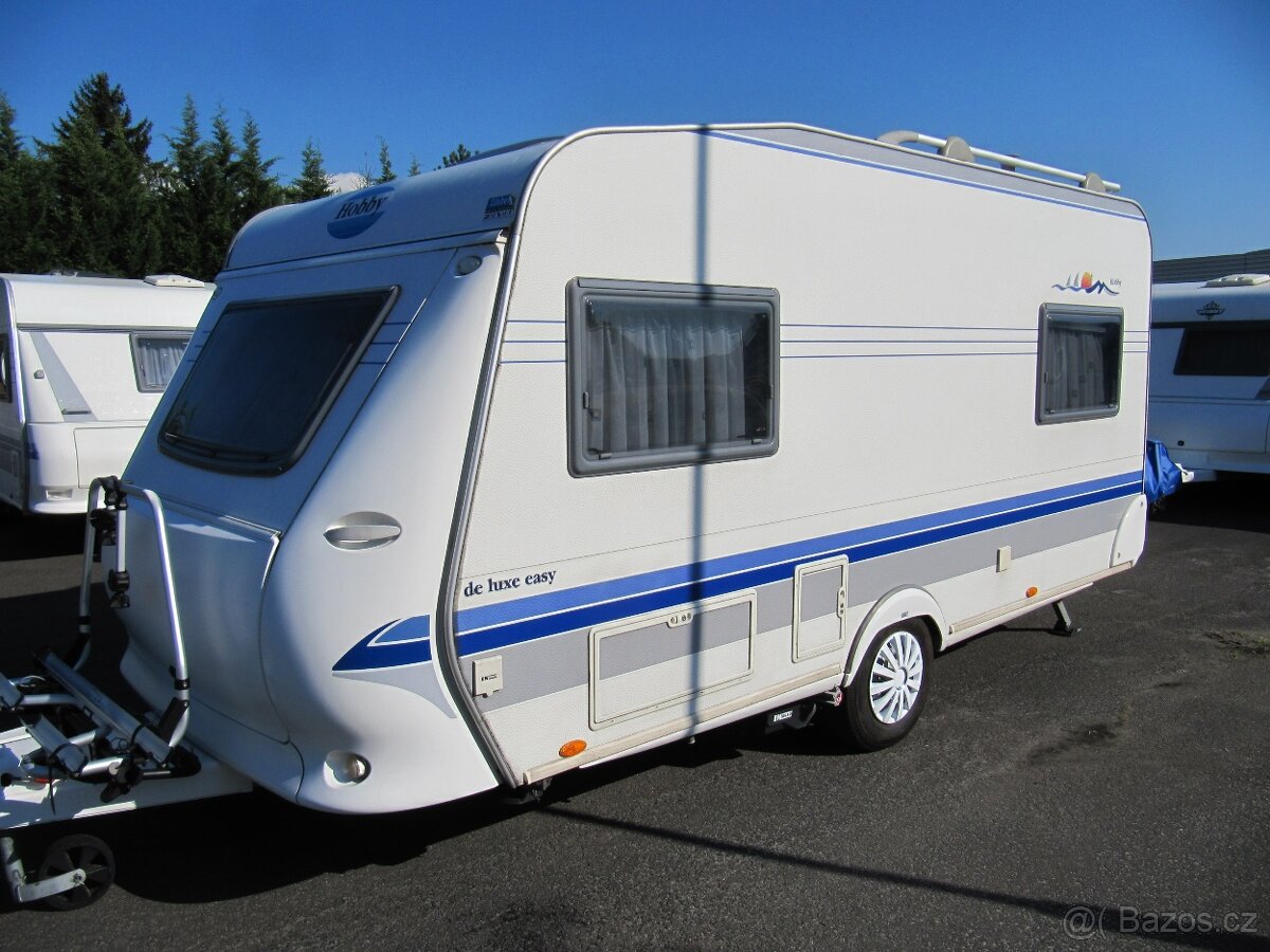 Prodám karavan Hobby 450 sf,r,v..2005 + mover + klima + stan