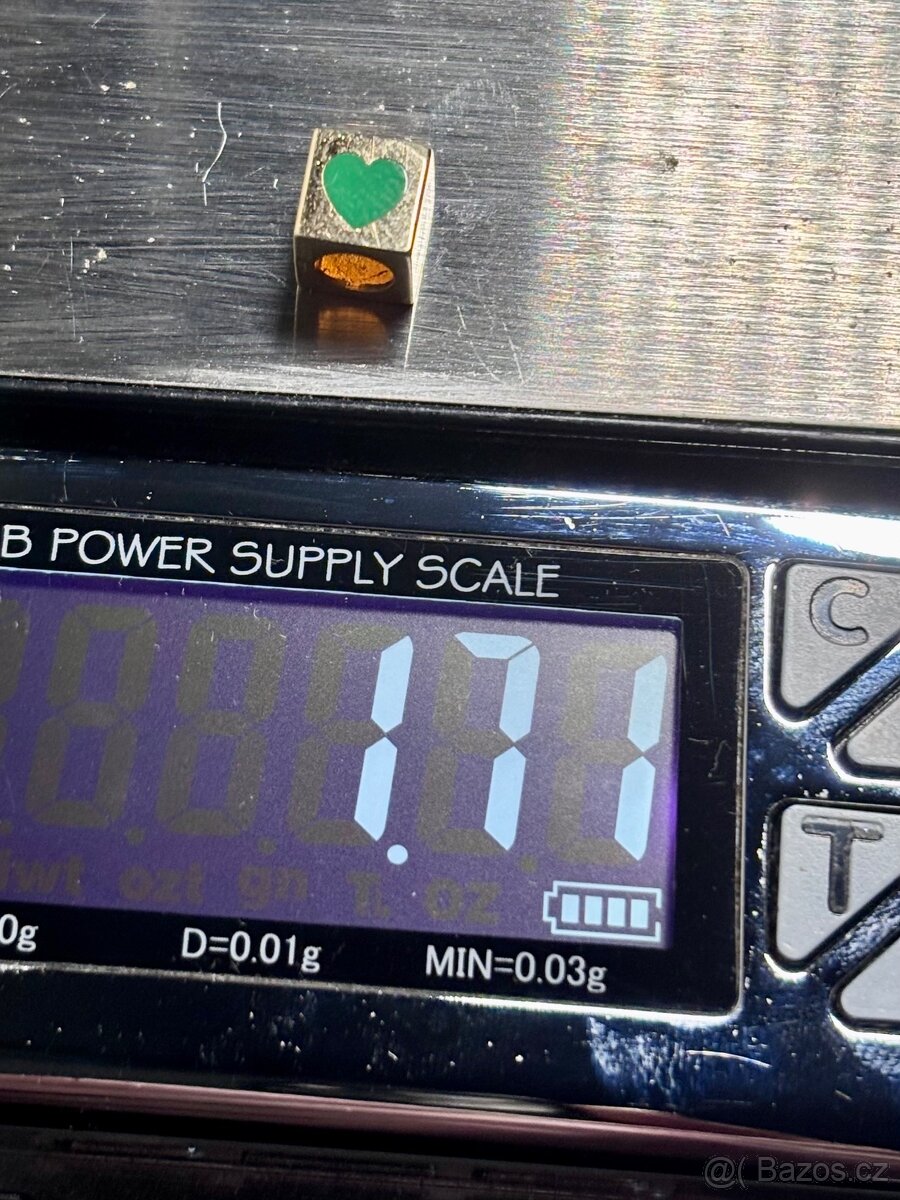 Pandora zlato 1,71g - 3