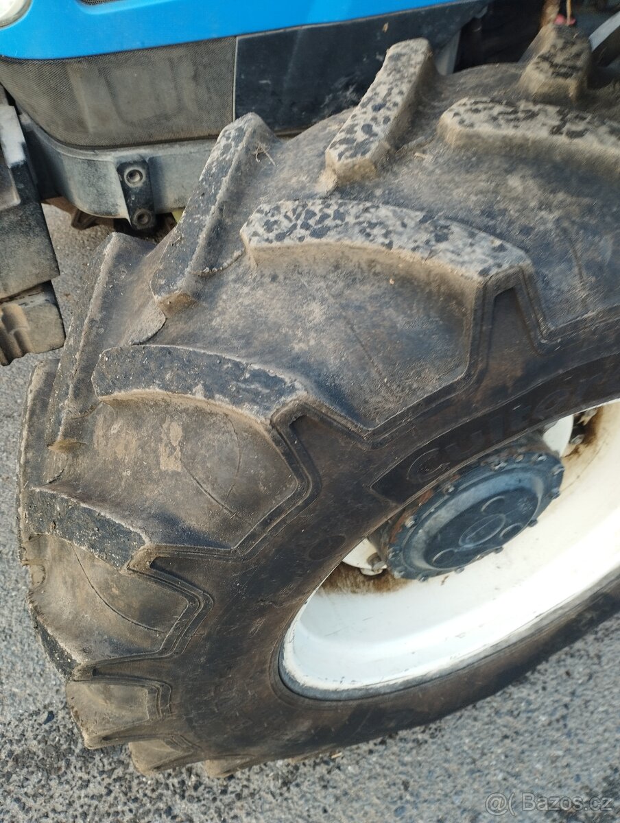 New Holland TL 100A. - 3