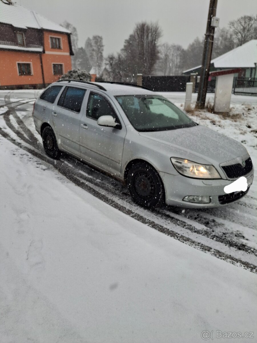 Škoda octavia 1.6 Tdi 77Kw - 3
