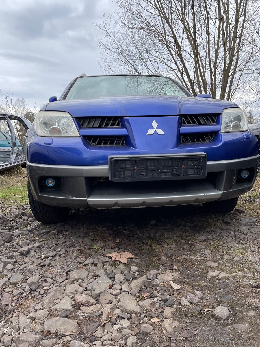 Kapota Mitsubishi Outlander I - 3