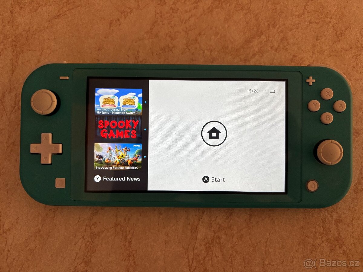 Nintendo Switch Lite Turquoise (světle tyrkysová) + 4 hry - 3