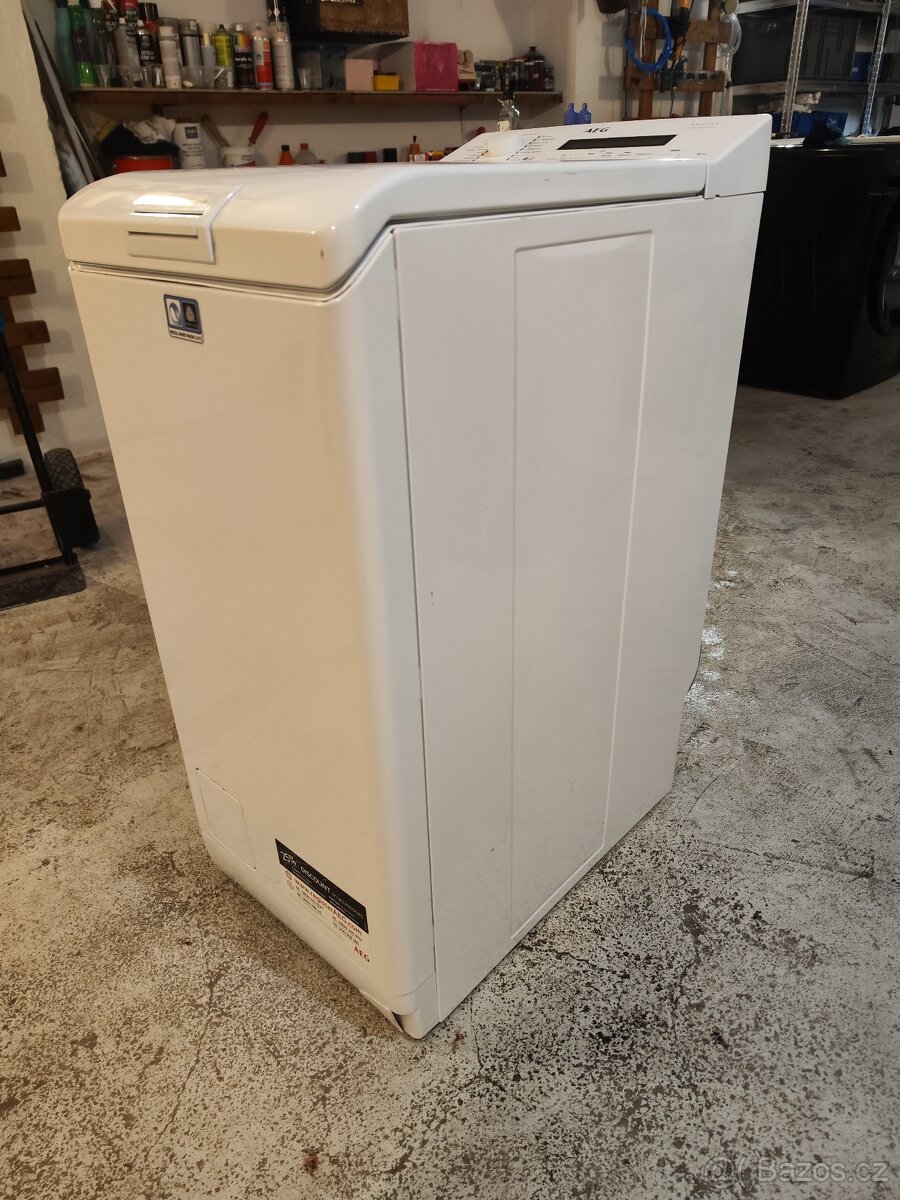 Vrchem plněná pračka AEG - 3