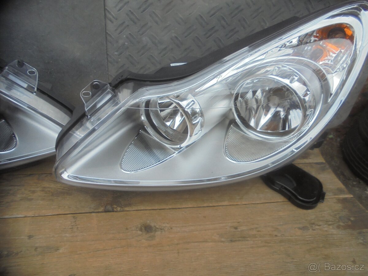 OPEL CORSA D - PŘEDNÍ SVĚTLA H7 , H1 - 3