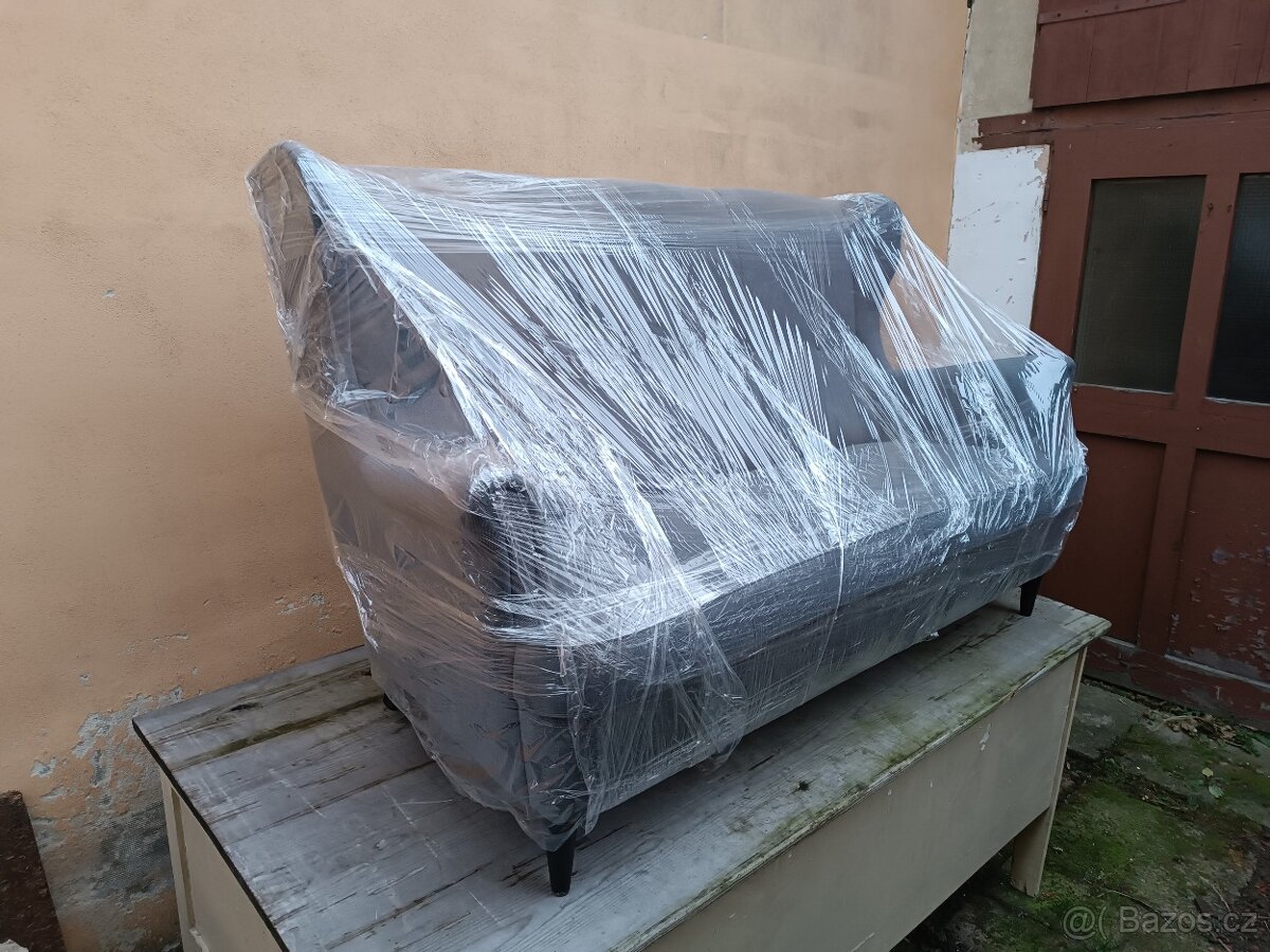 Pohodlná pohovka a podnožka Strandmon - 3