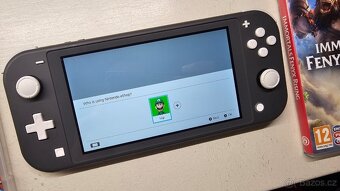 Nintendo Switch Lite + 2hry - 3