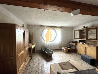 Prodej rodinného domu se zahradou o celkové ploše 240 m² v o - 3