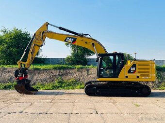 Pásový bagr Caterpillar 323 - 3