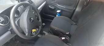 Subaru justy - 3