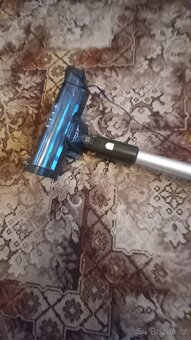 Tyčový a ručni vysavač značky Eta - 3