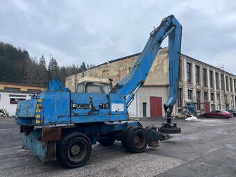 Kolový bagr 714.4 - 3