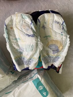 Nové plenky Pampers premium care 4 pants (9-15kg) přebytky - 3