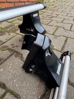 Příčníky 140 cm a patky Thule pro Octavia liftback - 3