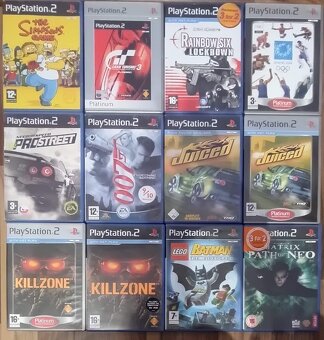 2× PS2 Slim (nefunkční) + volant + 3 ovladače + hry - 3
